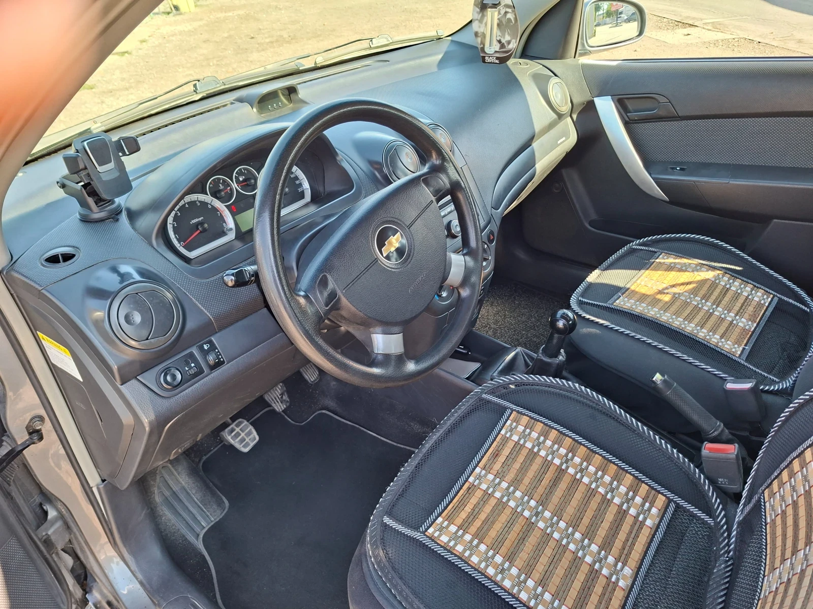 Chevrolet Aveo 1.2, снимка 12 - Автомобили и джипове - 55725606