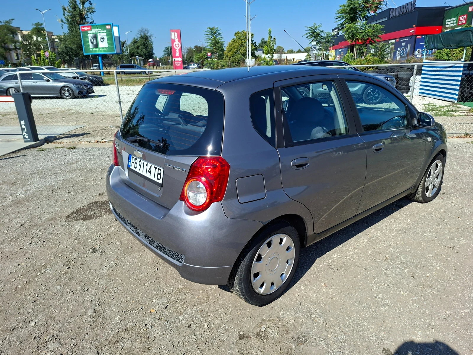 Chevrolet Aveo 1.2, снимка 16 - Автомобили и джипове - 55725606