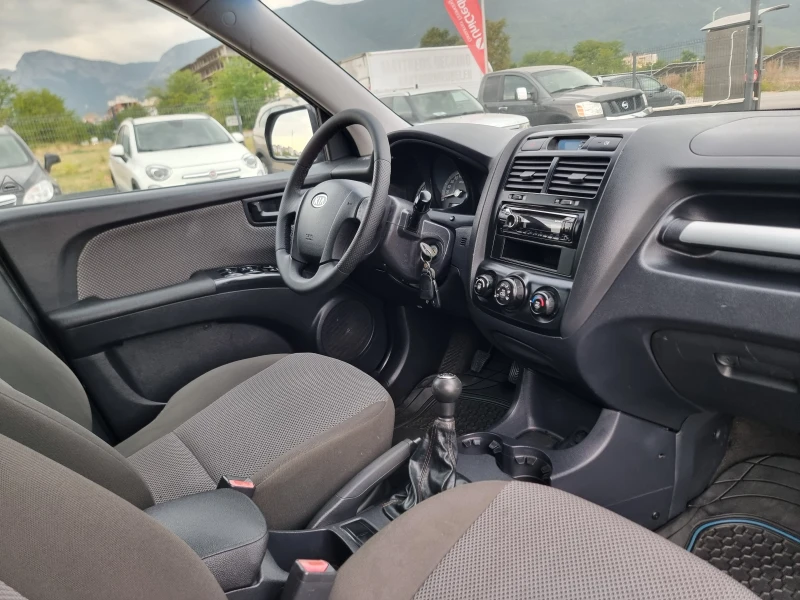 Kia Sportage 2.0I, снимка 15 - Автомобили и джипове - 51688766