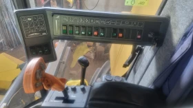 Комбайн New Holland Тх 66, снимка 13