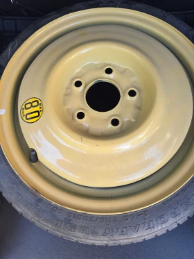        115/50R15