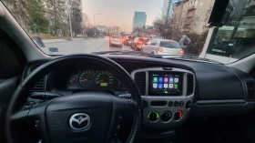 Mazda Tribute 2.0 бензин/газ  - 9300 лв. / 4755.01 € - 13588126 5