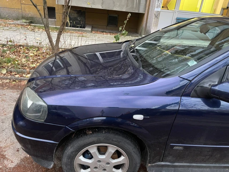 Opel Astra, снимка 12 - Автомобили и джипове - 48013911