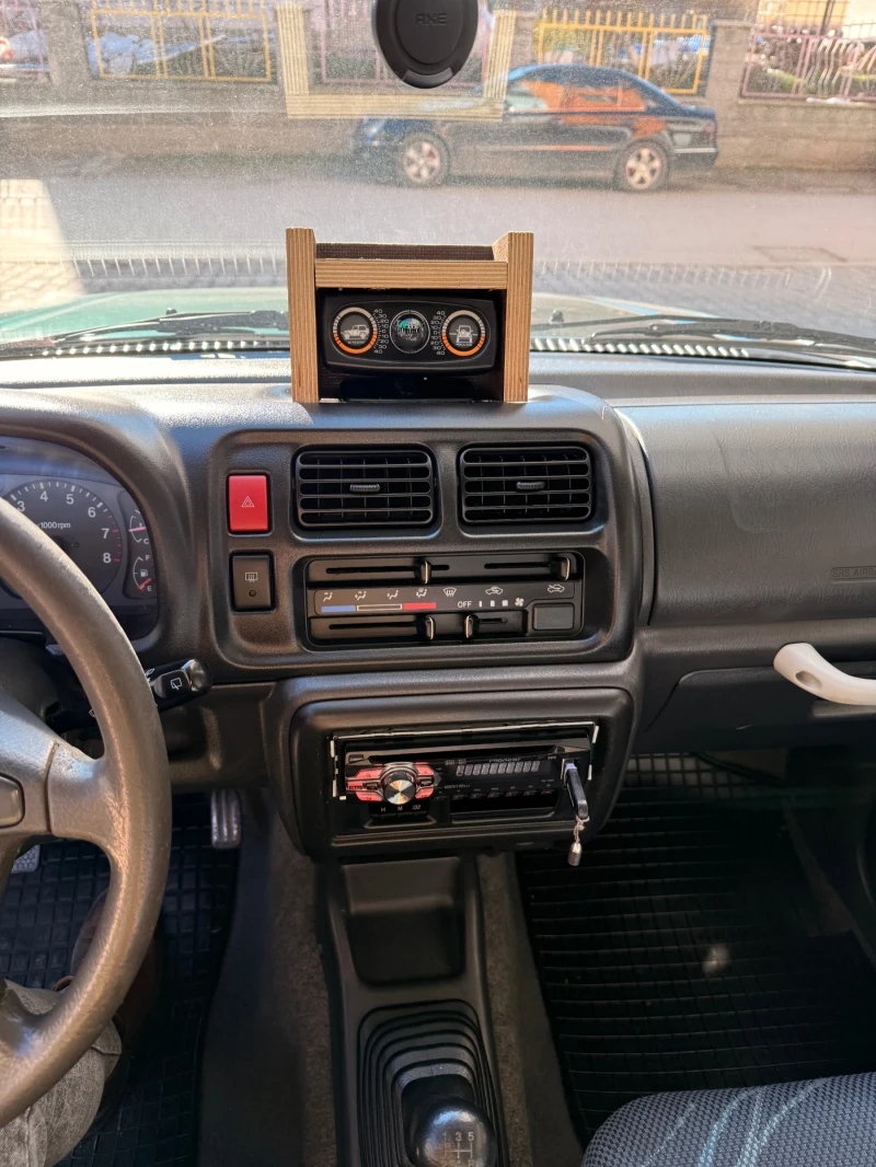 Suzuki Jimny 1.3 4x4 Japan, снимка 13 - Автомобили и джипове - 53053423