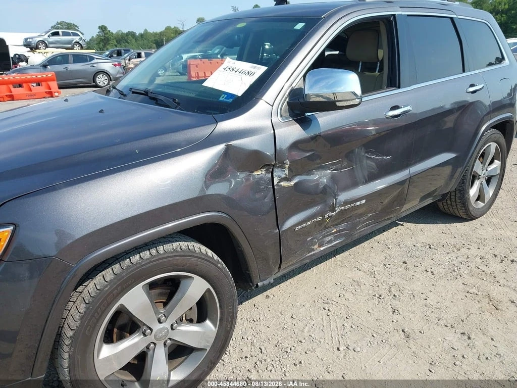 Jeep Grand cherokee 5.7 HEMI * OVERLAND * 4X4 * CARFAX * , снимка 9 - Автомобили и джипове - 55877563