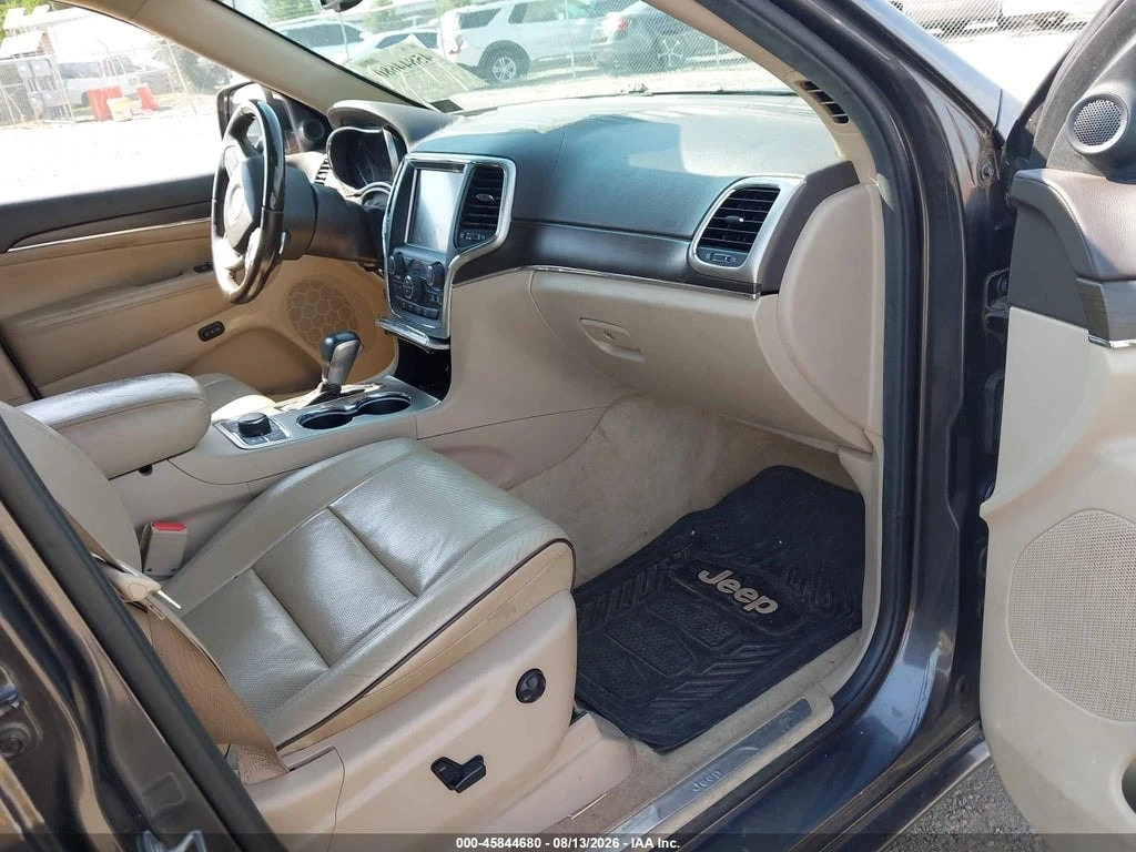Jeep Grand cherokee 5.7 HEMI * OVERLAND * 4X4 * CARFAX * , снимка 10 - Автомобили и джипове - 55877563