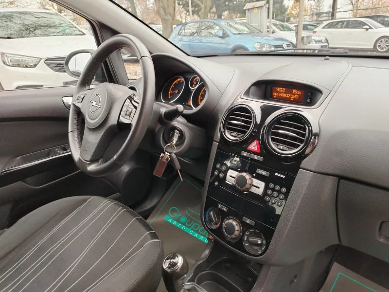 Opel Corsa 1.2i-86к.с/ГАЗОВ ИНЖЕКЦИОН/КЛИМАТИК!!! , снимка 12 - Автомобили и джипове - 52499829