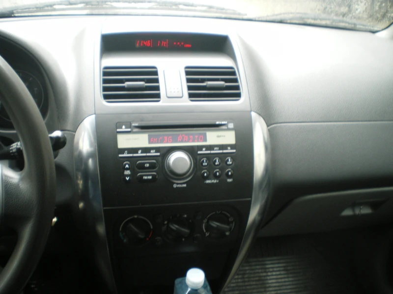 Suzuki SX4, снимка 12 - Автомобили и джипове - 53487840