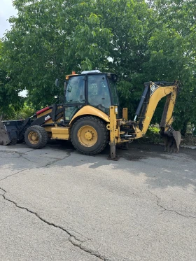 Багер Cat 428Е, снимка 1