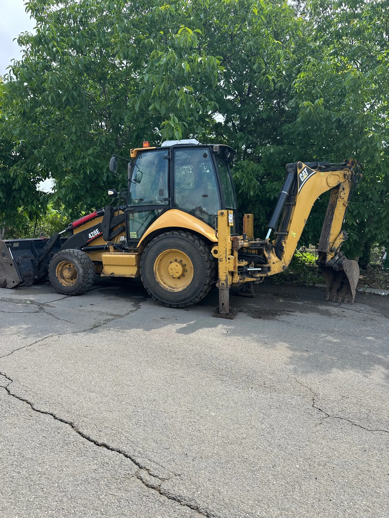 Багер Cat 428Е