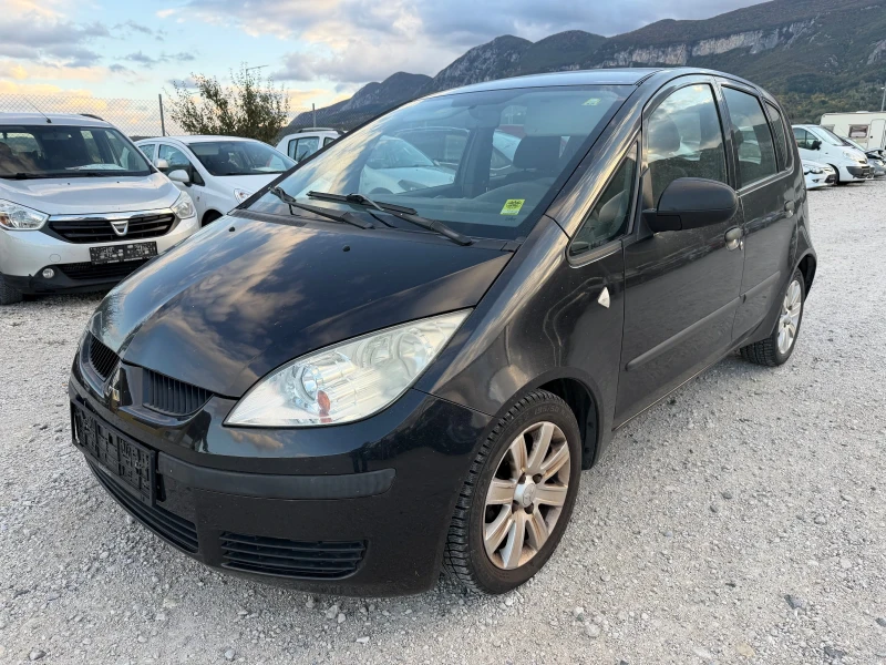 Mitsubishi Colt 1.1/75кс Климатик - 2600 лв. / 1329.36 € - 63569024 1