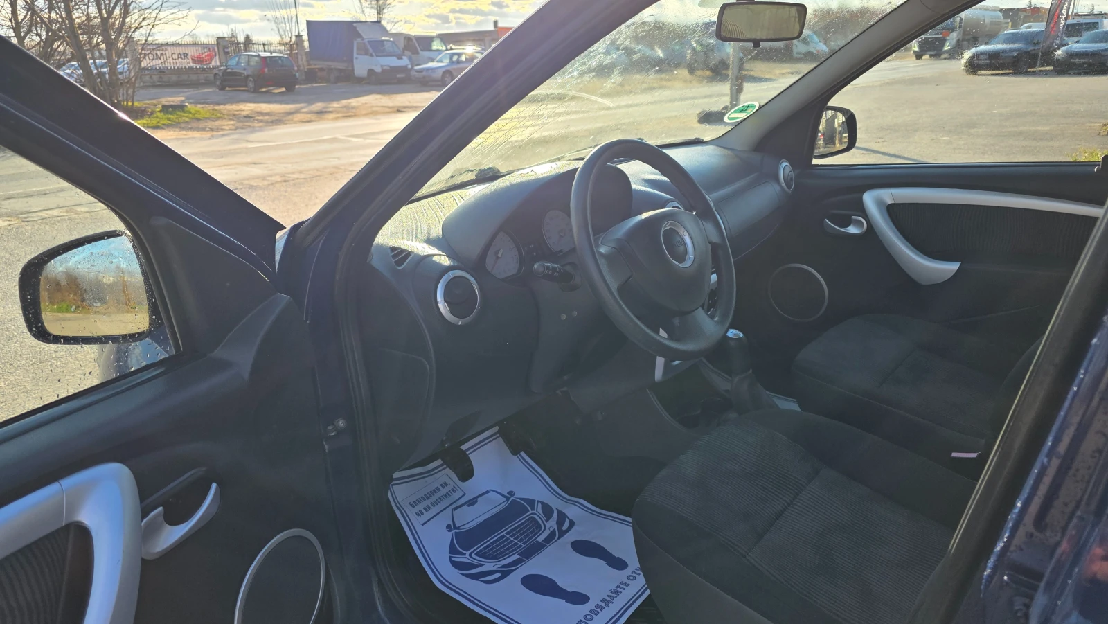 Dacia Logan 1.6i/87hp/УНИКАТ/FACE LIFT, снимка 6 - Автомобили и джипове - 53750776