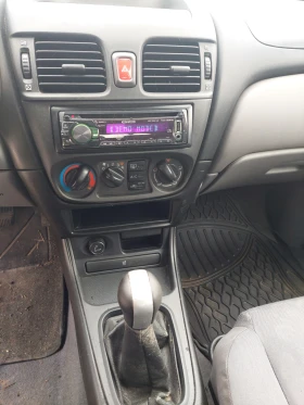 Nissan Almera 1.5dci климатик , снимка 4