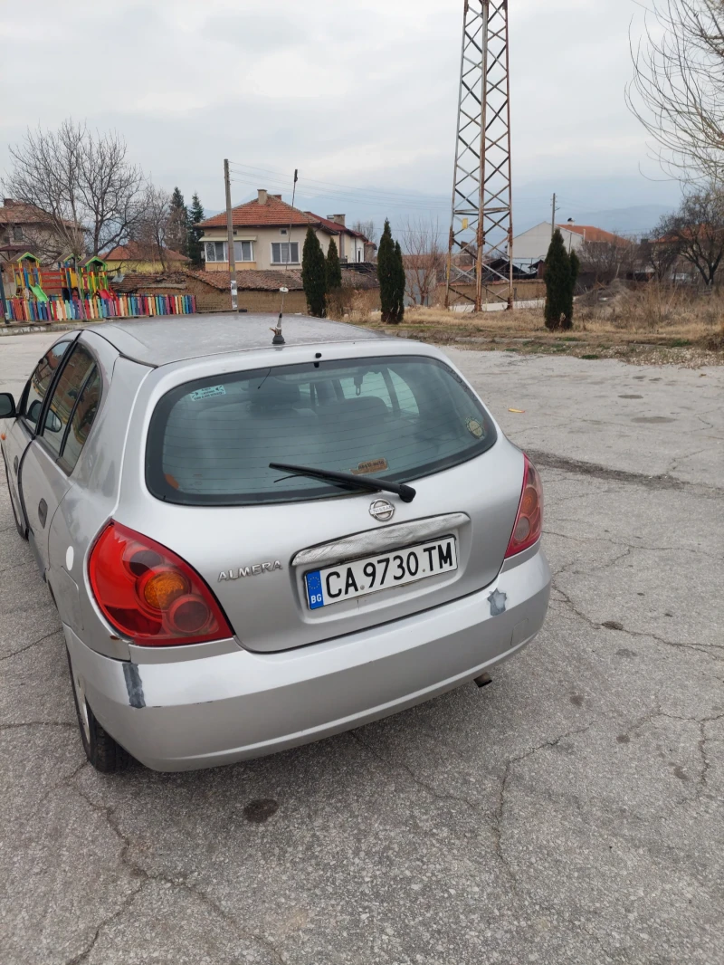 Nissan Almera 1.5dci климатик , снимка 8 - Автомобили и джипове - 48990489