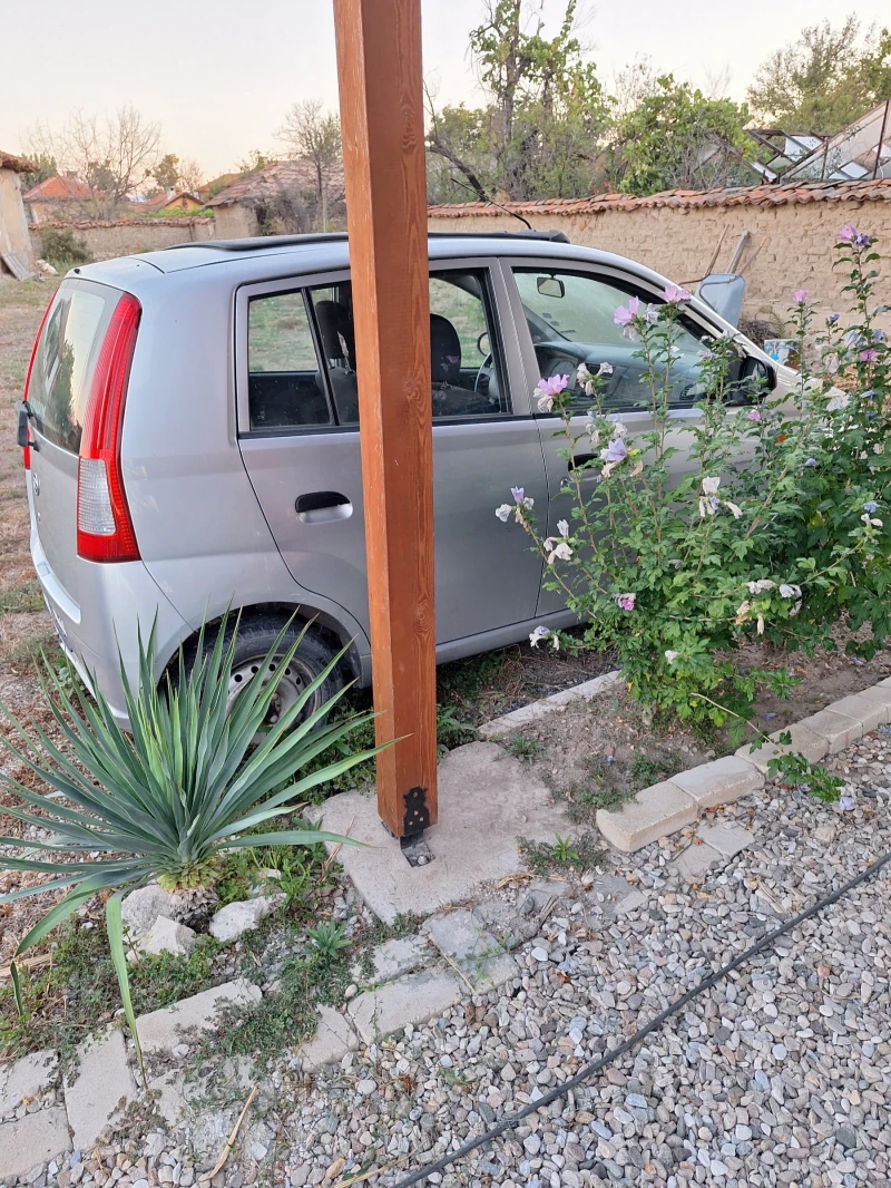 Daihatsu Cuore, снимка 9 - Автомобили и джипове - 51652502