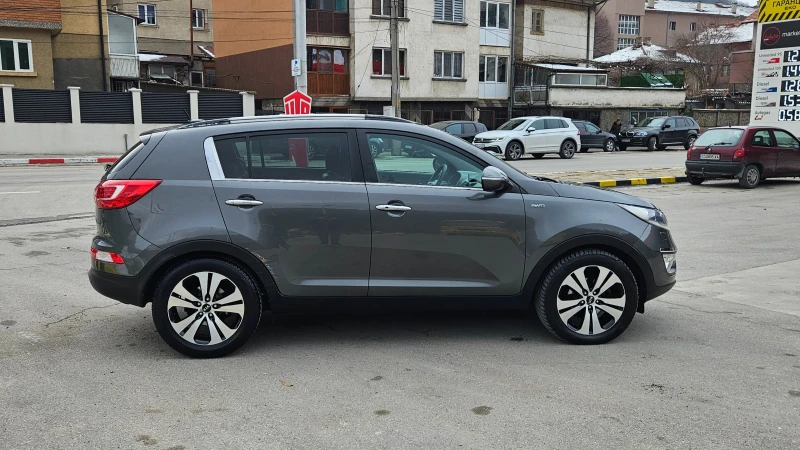 Kia Sportage 2.0 4X4/KOJA/NAVIG/PANORAMA/6skorosti, снимка 6 - Автомобили и джипове - 53090798