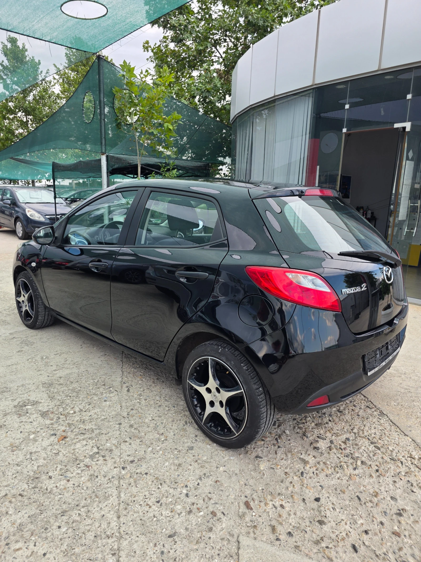 Mazda 2 1.3 75к.с. - изображение 8