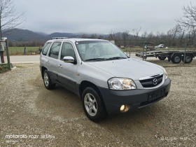 Mazda Tribute 2.0i 4+ 4 klimatik 124 k.c. - 4500 лв. / 2300.81 € - 16182005 2