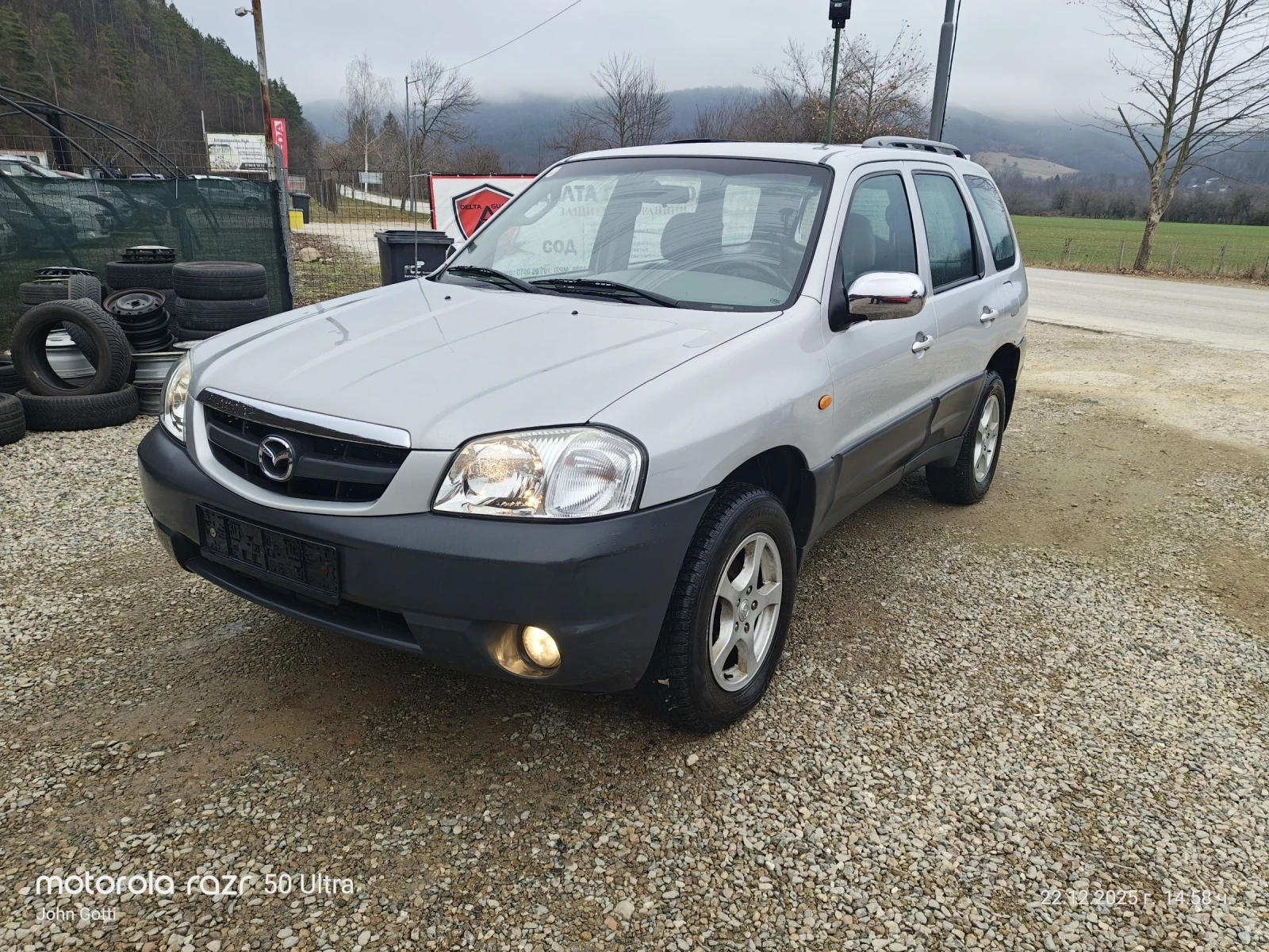 Mazda Tribute 2.0i 4+ 4 klimatik 124 k.c., снимка 1