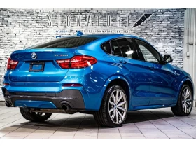 BMW X4 * M40i XDRIVE TOIT 6 CYL CUIR NAVIGATION CAMERA NO - 37150 лв. / 18994.49 € - 51707994 6