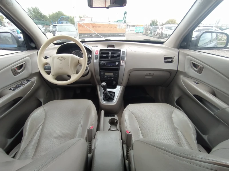 Hyundai Tucson 2.0 CRDi/4x4/Кожен салон, снимка 12 - Автомобили и джипове - 47544979