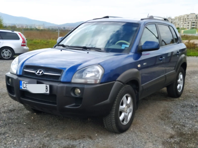 Hyundai Tucson 2.0 CRDi/4x4/Кожен салон, снимка 3 - Автомобили и джипове - 47544979