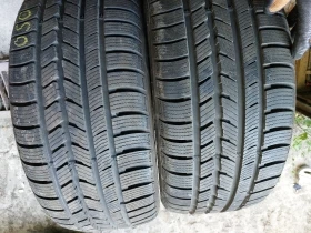 Гуми Зимни 245/45R18, снимка 1 - Гуми и джанти - 38093887