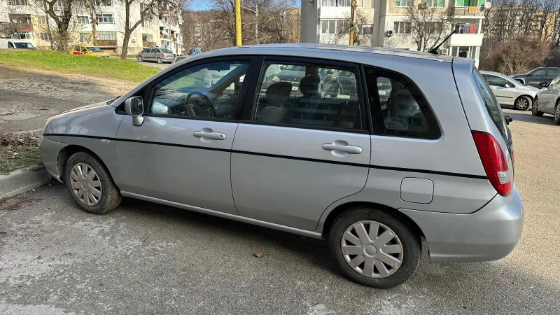 Suzuki Liana 1.6i, снимка 4 - Автомобили и джипове - 52958563