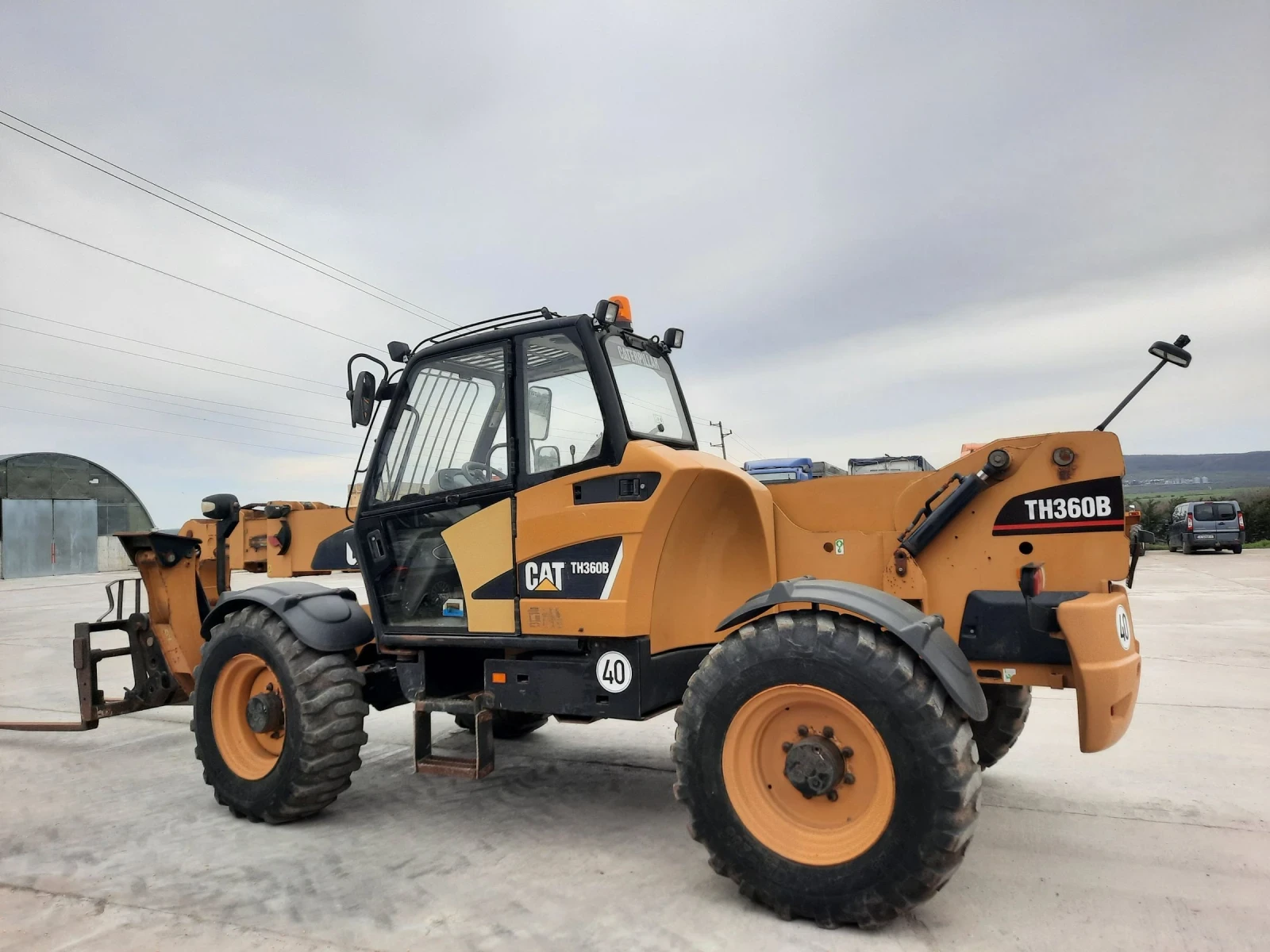 Телескопичен товарач Caterpillar TH360B-14M. - изображение 2