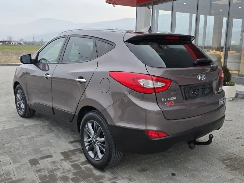 Hyundai IX35 2.0CRD/AVTOMAT/4X4/NAVI/KAMERA/KOJA/PODGREV/XSENON, снимка 6 - Автомобили и джипове - 48900122