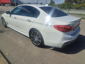 BMW 550 M Xdrive Full, снимка 14