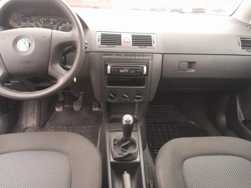 Skoda Fabia 1.2 70 PS, снимка 11 - Автомобили и джипове - 52682899