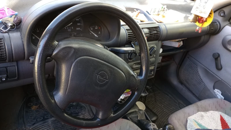 Opel Corsa, снимка 9 - Автомобили и джипове - 47659596