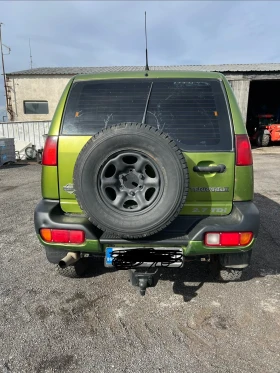 Nissan Terrano 2.7 TDI, снимка 10 - Автомобили и джипове - 53411057