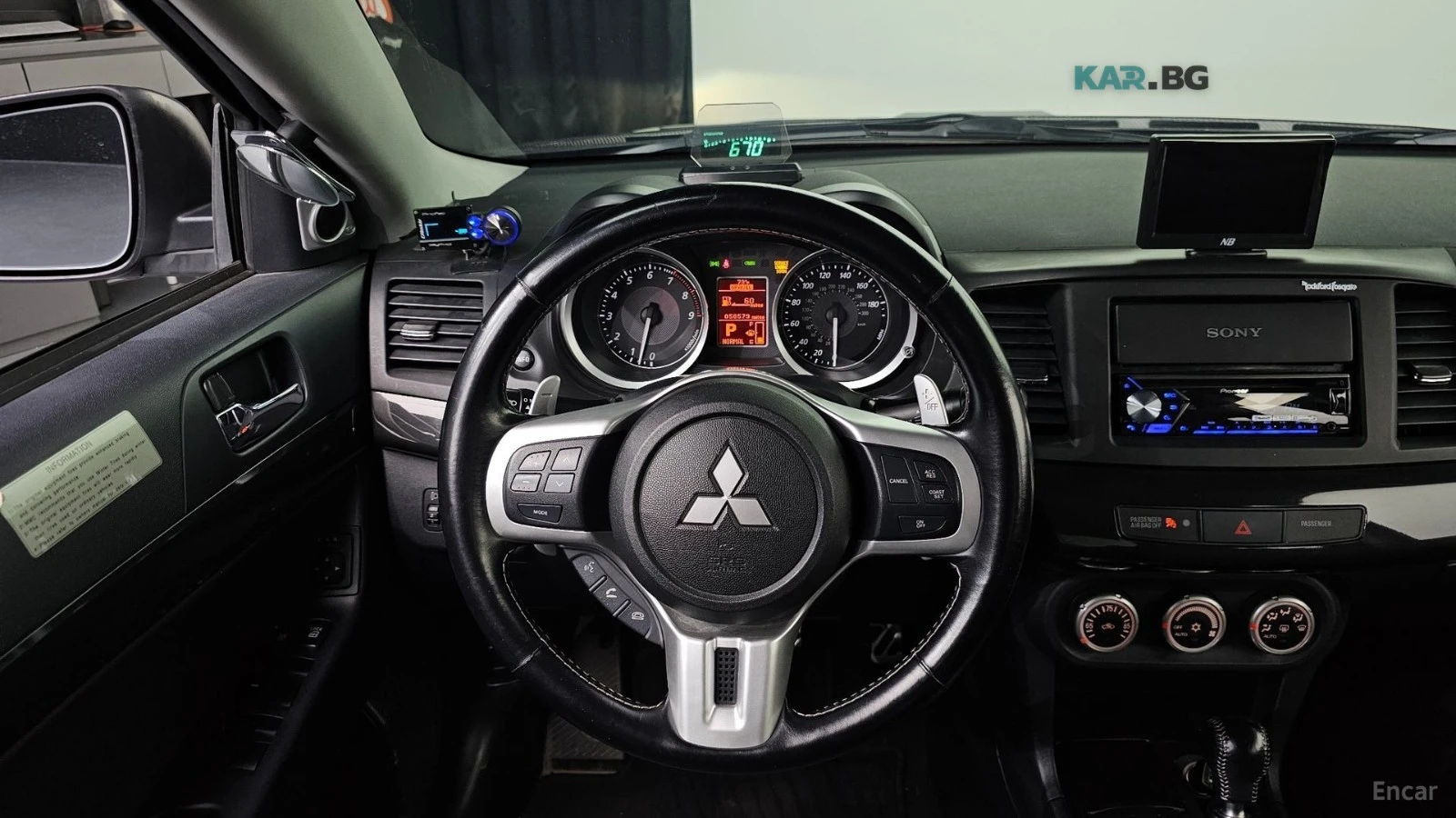Mitsubishi Lancer EVOLUTION / CARBON / DCT / HEADUP / ENKEI, снимка 15 - Автомобили и джипове - 54595916