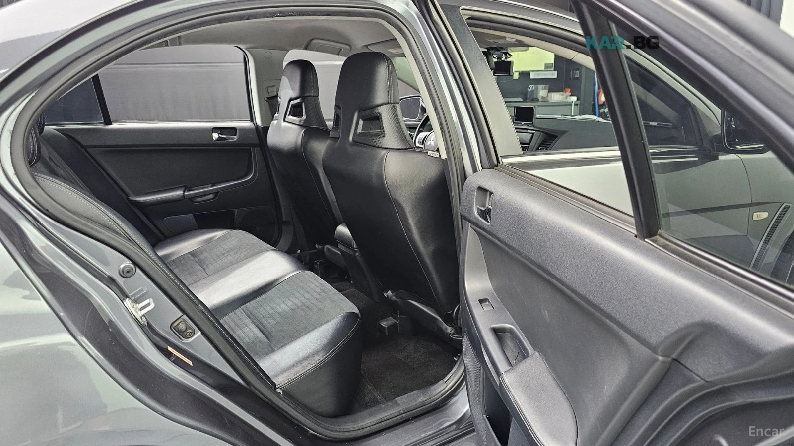 Mitsubishi Lancer EVOLUTION / CARBON / DCT / HEADUP / ENKEI, снимка 13 - Автомобили и джипове - 54595916