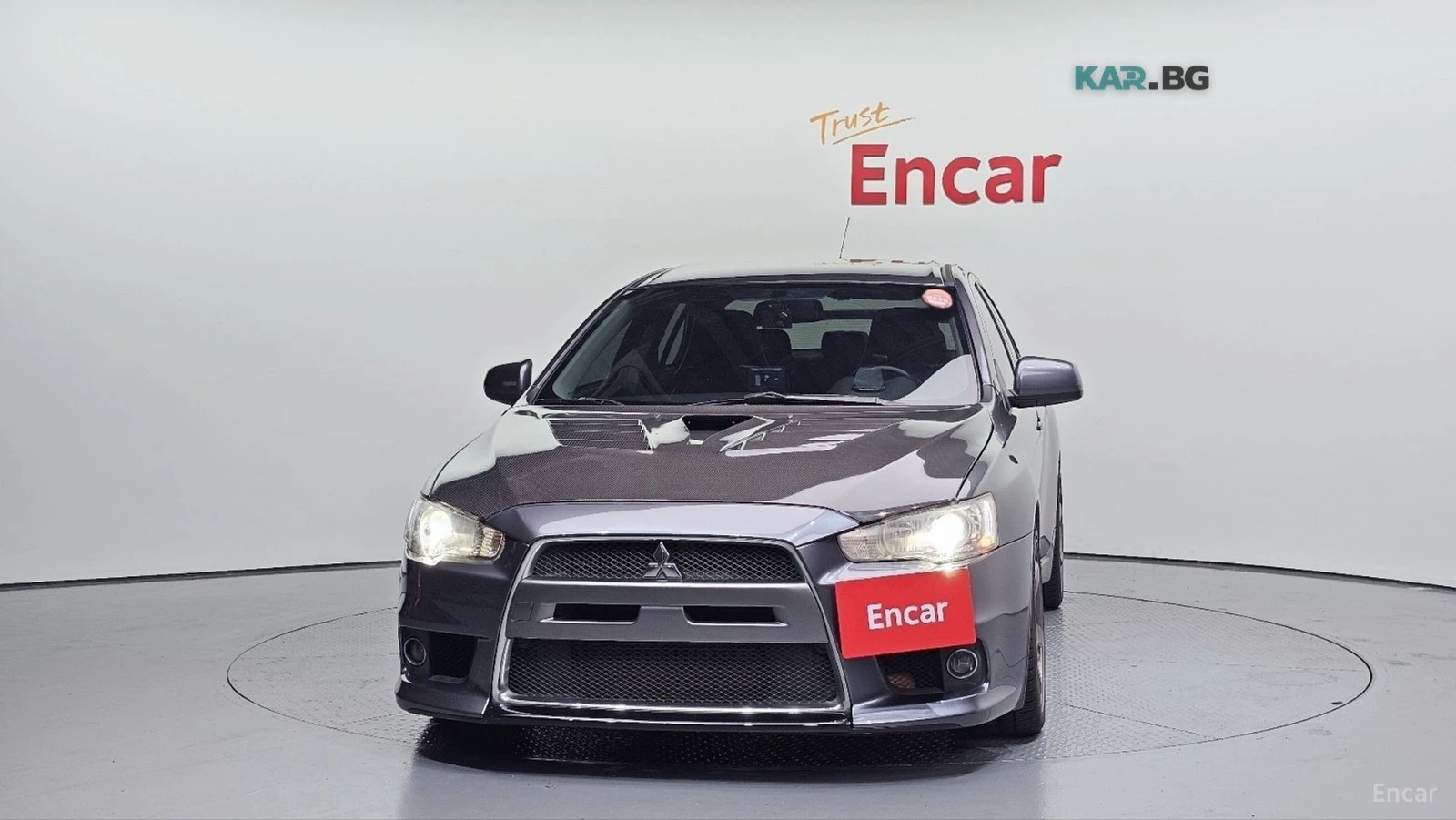 Mitsubishi Lancer EVOLUTION / CARBON / DCT / HEADUP / ENKEI, снимка 3 - Автомобили и джипове - 54595916