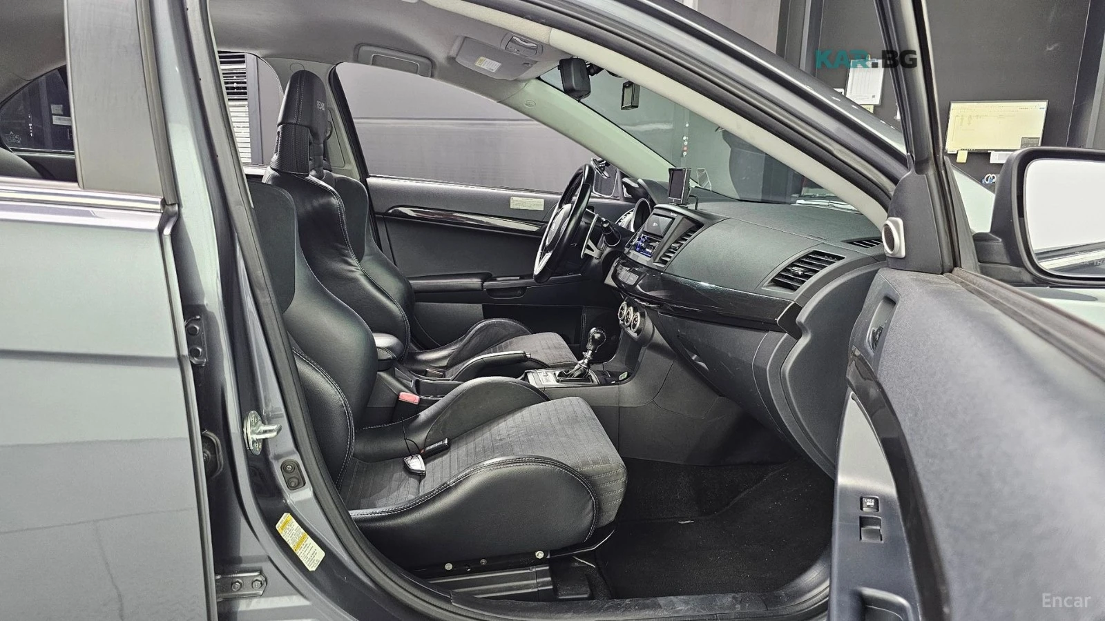 Mitsubishi Lancer EVOLUTION / CARBON / DCT / HEADUP / ENKEI, снимка 12 - Автомобили и джипове - 54595916