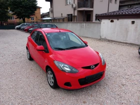     Mazda 2 1.4i  86