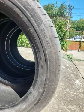 Гуми Летни 315/40R21, снимка 13