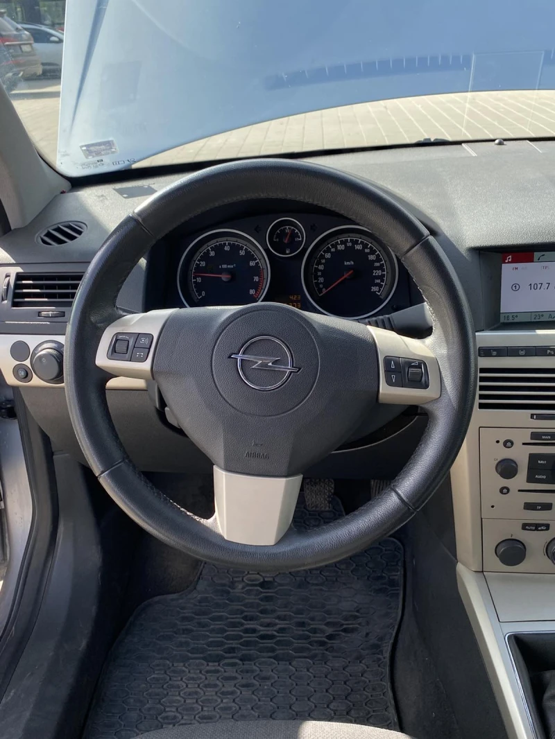 Opel Astra H, снимка 11 - Автомобили и джипове - 48621821