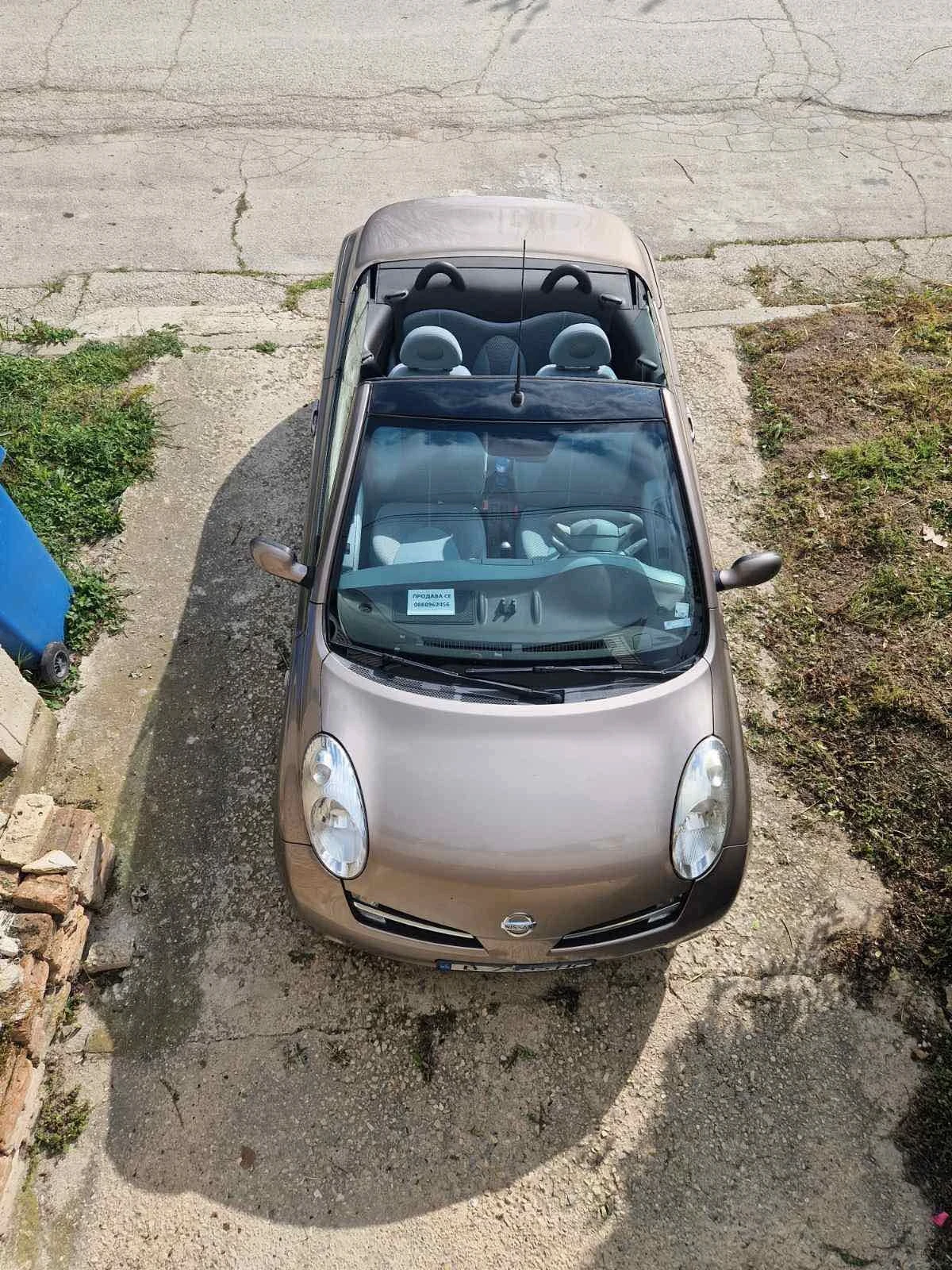 Nissan Micra СС - изображение 5