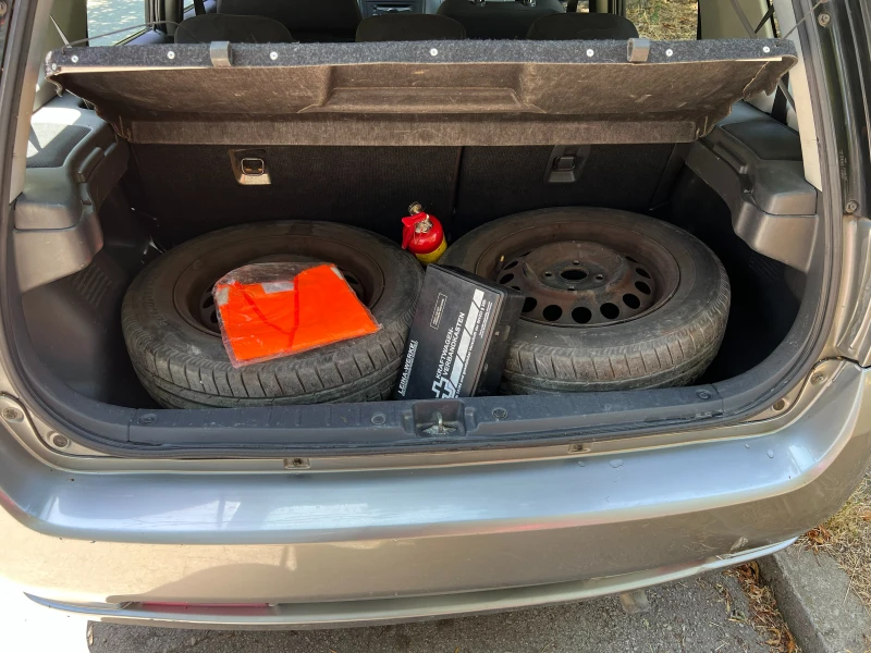 Suzuki Ignis 1.3 DDiS, снимка 8 - Автомобили и джипове - 52035461