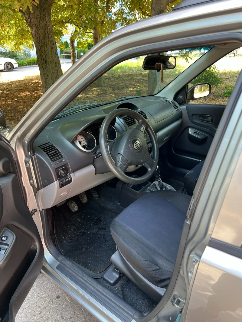 Suzuki Ignis 1.3 DDiS, снимка 6 - Автомобили и джипове - 52035461
