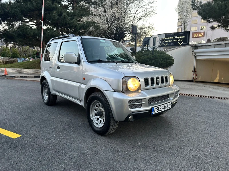 Suzuki Jimny 1.3i DOHC 4x4, снимка 5 - Автомобили и джипове - 49564360