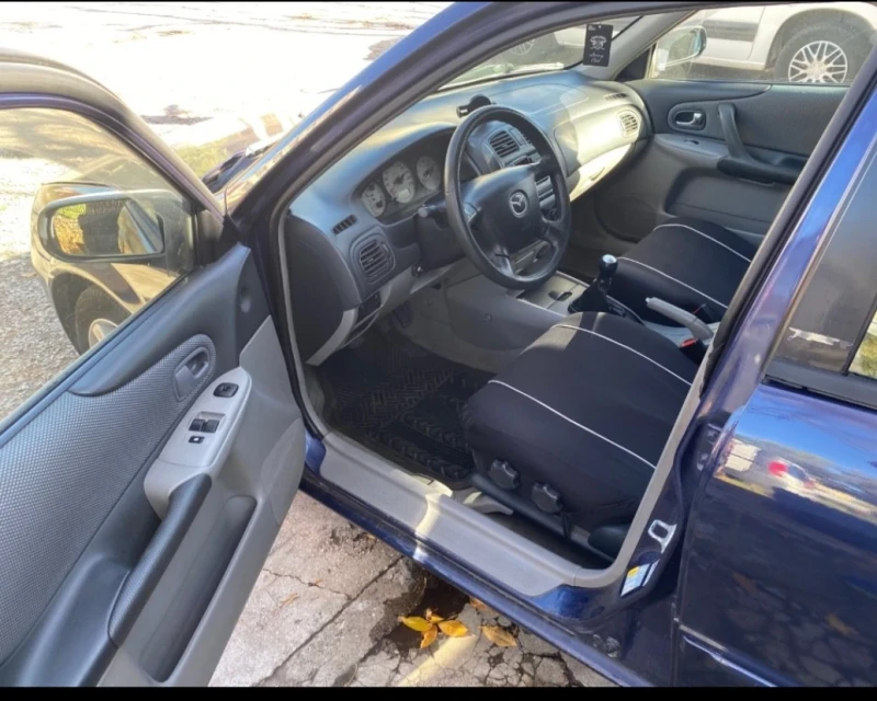 Mazda 323, снимка 5 - Автомобили и джипове - 52886559