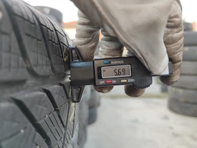 Гуми Зимни 215/65R17, снимка 6 - Гуми и джанти - 48893100