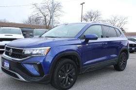 ������ VW Taos