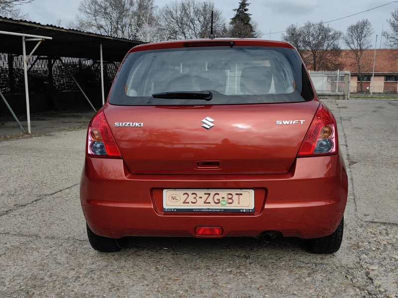 Suzuki Swift 1.3I , снимка 6 - Автомобили и джипове - 49150993