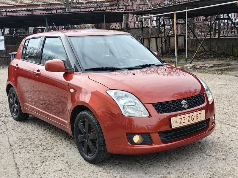 Suzuki Swift 1.3I , снимка 3 - Автомобили и джипове - 49150993